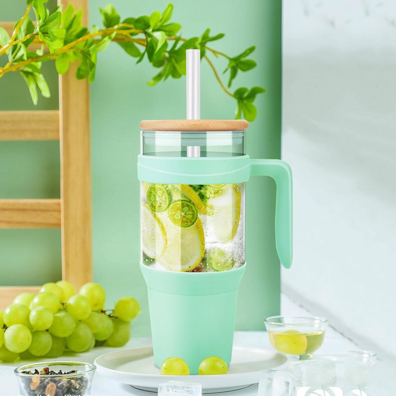 imageTronco 40 oz Glass Tumbler with Handle Bamboo Lid and Straw Fits Cup Holders Reusable Glass Water Bottles for Iced Coffee and Smoothie LeadFree BPAFreeLight GreenBamboo