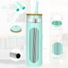 imageTronco 22oz Glass Tumbler with Bamboo Lid and Straw Reusable Iced Coffee Cup for Boba Tea Smoothies ampamp Cold Drinks SpillProof Glass Cup with Silicone Sleeve Dishwasher Safe BPAFree Pack of 1PureBlue