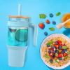 imageTronco 40 oz Glass Tumbler with Handle Bamboo Lid and Straw Fits Cup Holders Reusable Glass Water Bottles for Iced Coffee and Smoothie LeadFree BPAFreeskyblueBamboo